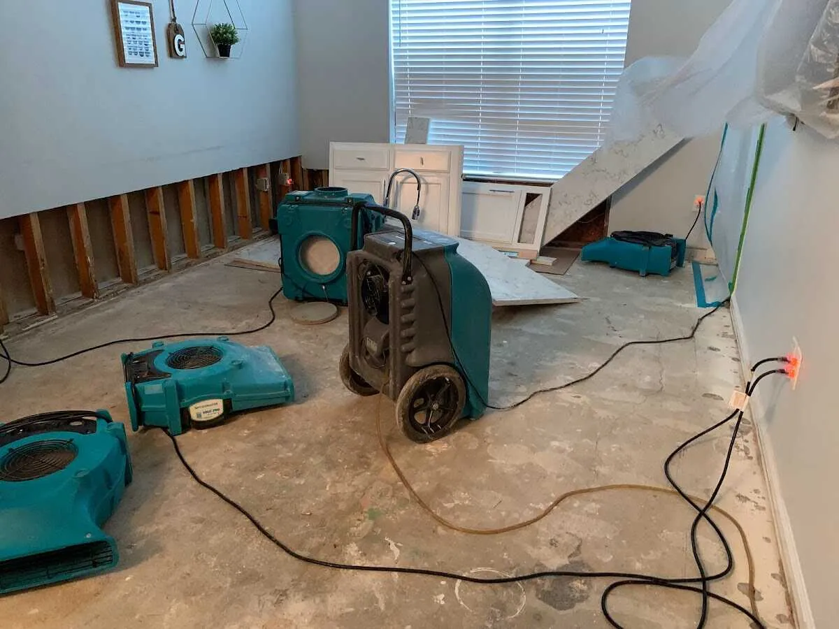 Dehumidifier in flood-cut room for Water Extraction & Removal in Taos